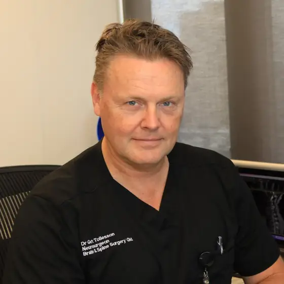 Dr Gert Tollesson, neurosurgeon, in his Brisbane consulting rooms
